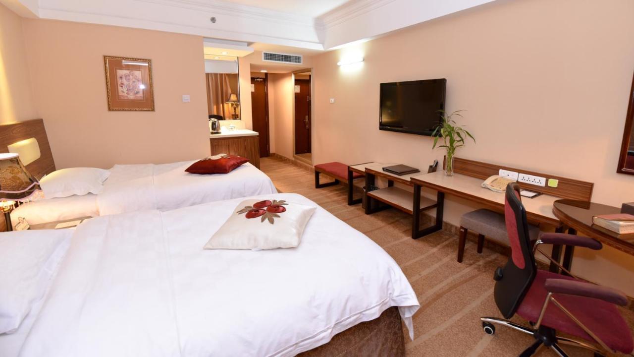 Bremen Holiday Hotel Harbin Extérieur photo